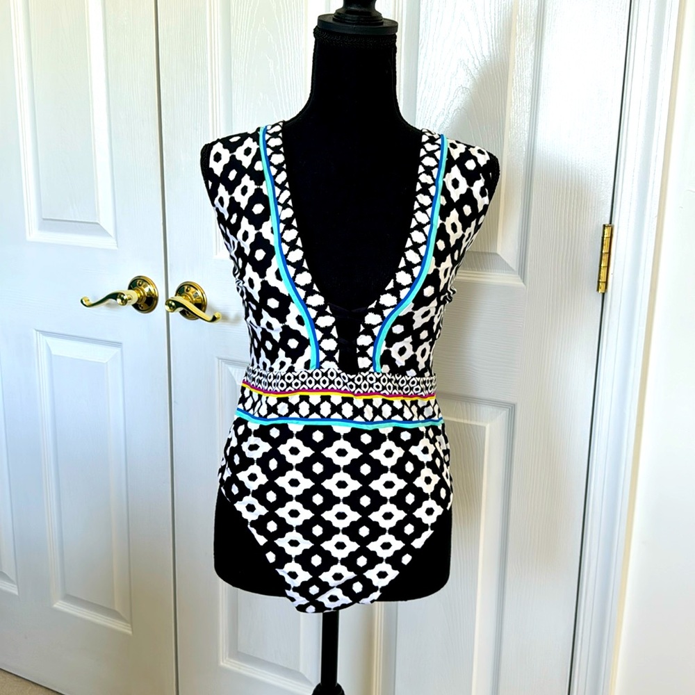 Trina Turk one piece with matching cover pant. Size 12.